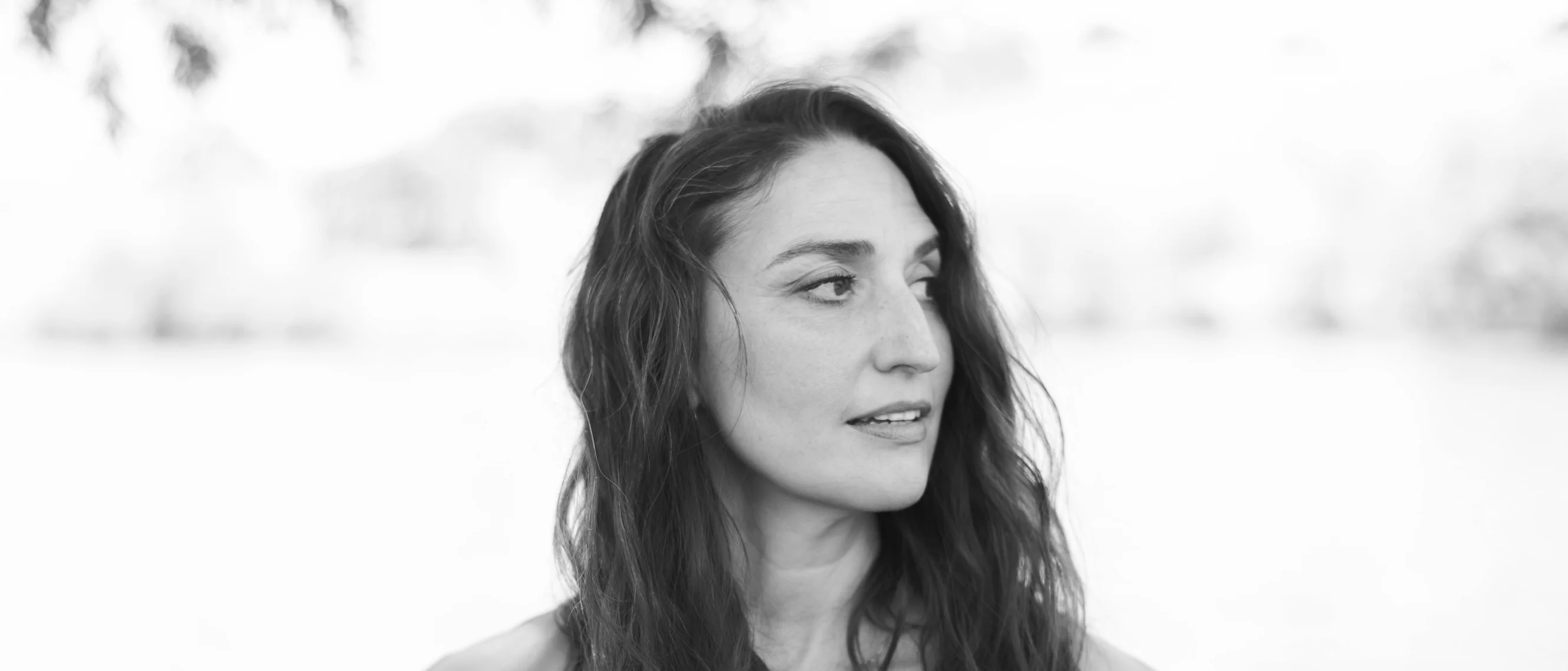 Sara Bareilles working on the piano in the studio church